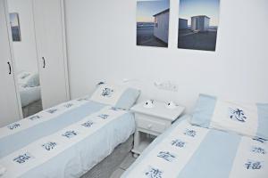 Posteľ alebo postele v izbe v ubytovaní Casa Melera