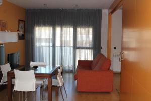 A seating area at Apartamentos Turísticos Can Rocamora