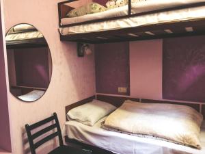 Letto o letti in una camera di DownTown B&B