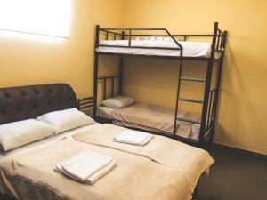 Letto o letti in una camera di DownTown B&B