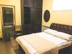 Letto o letti in una camera di DownTown B&B