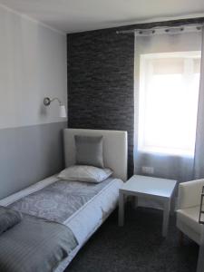 Posteľ alebo postele v izbe v ubytovaní White Home Room