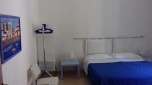 Posteľ alebo postele v izbe v ubytovaní B&B CARAVAGGIO SIRACUSA 200 Metres from Ortigia