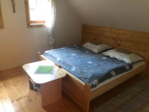 Postel nebo postele na pokoji v ubytování Chata Obšívanka