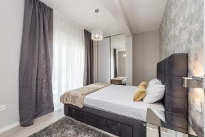 Łóżko lub łóżka w pokoju w obiekcie Luxury Apartments Marija