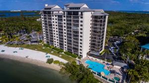 an aerial view of a large building on the beach at Resort Harbour Properties - Fort Myers / Sanibel Gateway in Punta Rassa