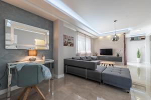 Telewizja i/lub zestaw kina domowego w obiekcie Luxury Apartments Marija