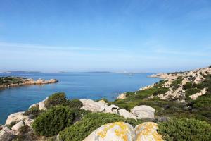 a view from the top of a hill overlooking a body of water at Residenza Marginetto in La Maddalena