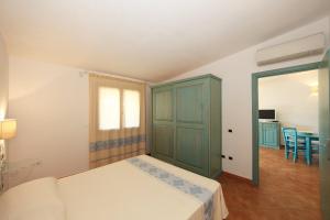 Postel nebo postele na pokoji v ubytování Residenza Marginetto