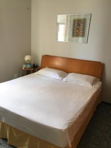 Giường trong phòng chung tại Na Região Mais Nobre de Fortaleza +13 ảnh