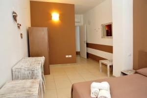 Postel nebo postele na pokoji v ubytování Hotel La Punta