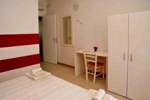 Postel nebo postele na pokoji v ubytování Hotel La Punta