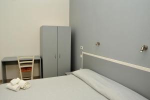 Postel nebo postele na pokoji v ubytování Hotel La Punta
