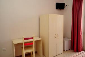 TV a/nebo společenská místnost v ubytování Hotel La Punta