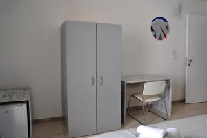 Postel nebo postele na pokoji v ubytování Hotel La Punta
