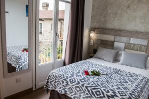 Łóżko lub łóżka w pokoju w obiekcie Casa da Balconada