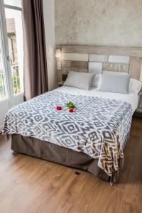 Łóżko lub łóżka w pokoju w obiekcie Casa da Balconada