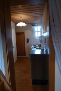 a kitchen with a sink and a counter top at Jocklerturm in Sulzfeld am Main