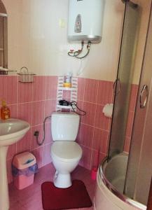 Ένα μπάνιο στο Mini Hotel Furmi