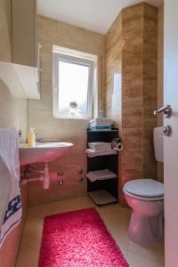 Koupelna v ubytování Apartments Mijo