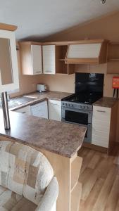 Nhà bếp/bếp nhỏ tại Mobil Home Soulac