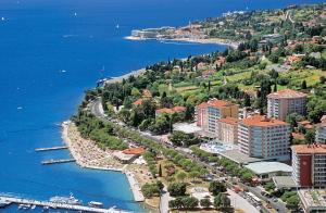 an aerial view of a city next to the water at Amazing View Pirano in Piran