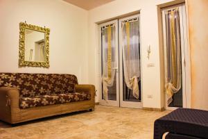 A seating area at Ricciolandia Suites