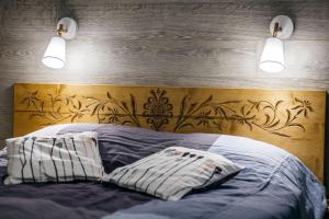 Posteľ alebo postele v izbe v ubytovaní Domki Tatrzański Ogród Regional Houses Zakopane