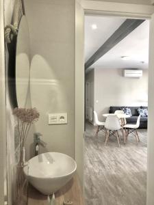 Posezení v ubytování Plaza 5 Carabanchel Apartment + 29 fotografií