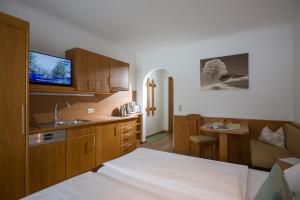 A bed or beds in a room at Ferienhaus Resi & Obermoser