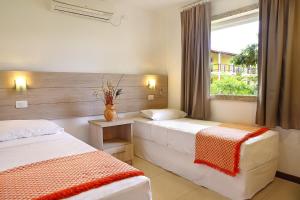 Postel nebo postele na pokoji v ubytování La Torre Resort All Inclusive + 37 fotografií