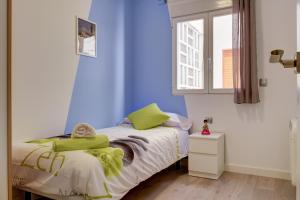 Postel nebo postele na pokoji v ubytování Apartamentos San Lázaro 2