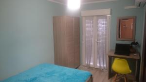 Łóżko lub łóżka w pokoju w obiekcie Apartment Joanna Grau de Gandia