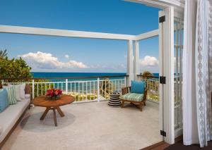a balcony with a view of the ocean at Half Moon in Montego Bay