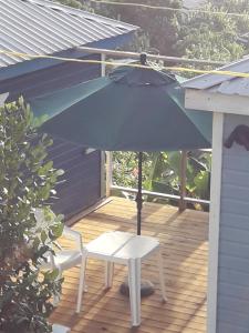 Balkón nebo terasa v ubytování Cosy Hut 2
