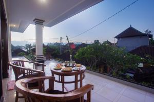 Balkón nebo terasa v ubytování Nengah House Ubud + 37 fotografií