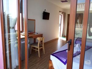 Postel nebo postele na pokoji v ubytování Ms Tri Homestay