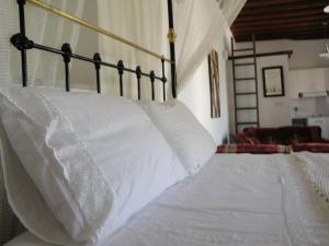 Postel nebo postele na pokoji v ubytování Kaizer Agrotourism