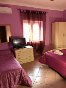 Postel nebo postele na pokoji v ubytování Cilento