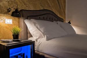 Кровать или кровати в номере StarHome Navona