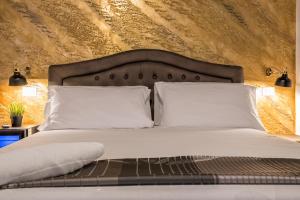 Кровать или кровати в номере StarHome Navona