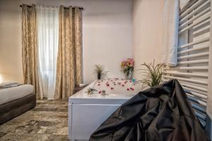 Кровать или кровати в номере StarHome Navona