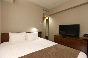 TV a/nebo společenská místnost v ubytování Daiwa Roynet Hotel Nagoya Taiko dori Side