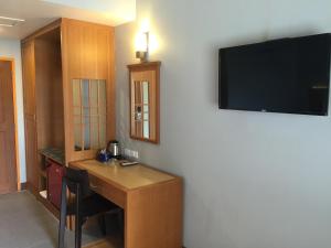 TV a/nebo společenská místnost v ubytování D-ONE Hotel