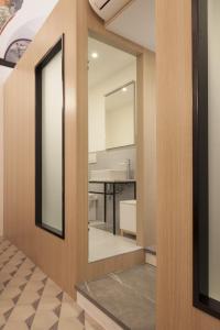 A kitchen or kitchenette at Genova Suite Art