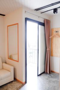 Posezení v ubytování Izen Plus Budget Hotel & Residence