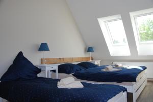 Posteľ alebo postele v izbe v ubytovaní Apartment Ptačí Dům