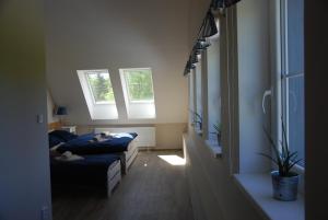 Posteľ alebo postele v izbe v ubytovaní Apartment Ptačí Dům