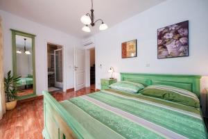 Postel nebo postele na pokoji v ubytování Villa Ester