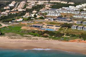 an aerial view of a resort on the beach at Martinhal Sagres Beach Family Resort Hotel in Sagres